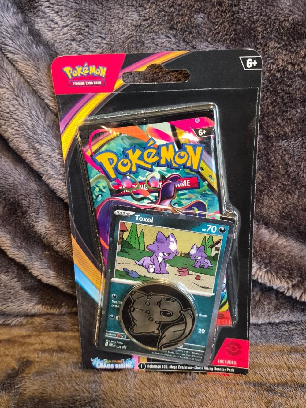Pokémon TCG Mega Evolution—Chaos Rising 1 Booster Pack Toxel Promo Card & Coin
